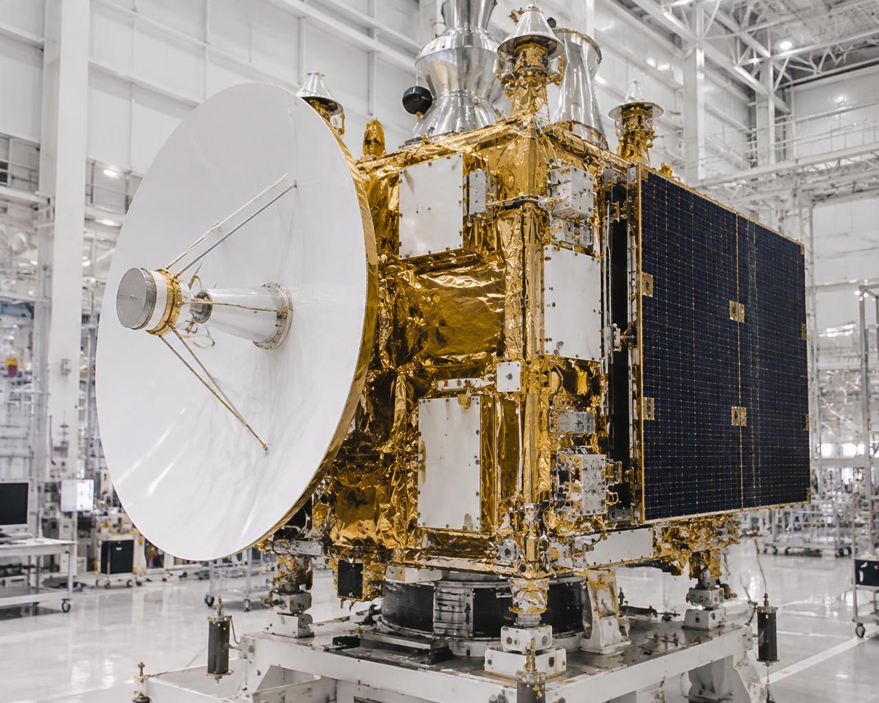 Communications satellite with gold thermal insulation in a spacecraft integration facility